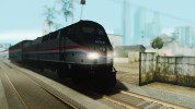 Los pasajeros de la locomotora GE P42DC Amtrak Phase III 40th Anniversary
