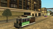 The tram is white with bright green stripes  миниатюра 1