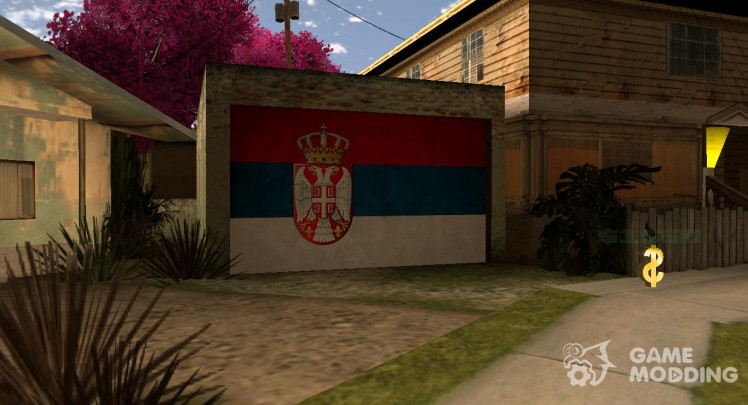 El serbio de la bandera en la puerta del garaje